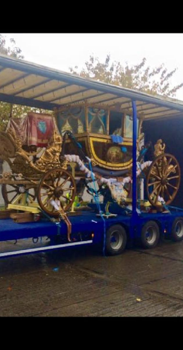 Carriage loaded onto the back of lorry