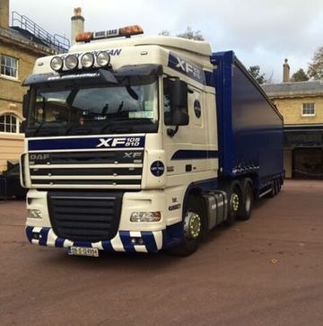 Large lorry loaded with machinery to relocate